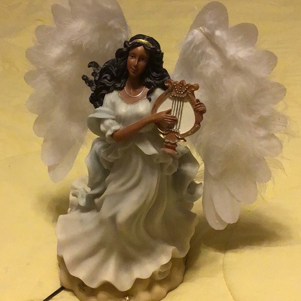 EUC ANGEL FIGURINE, LIGHTS AND PLAYS MUSIC. AFRICAN-AMERICAN cords tall 12”high